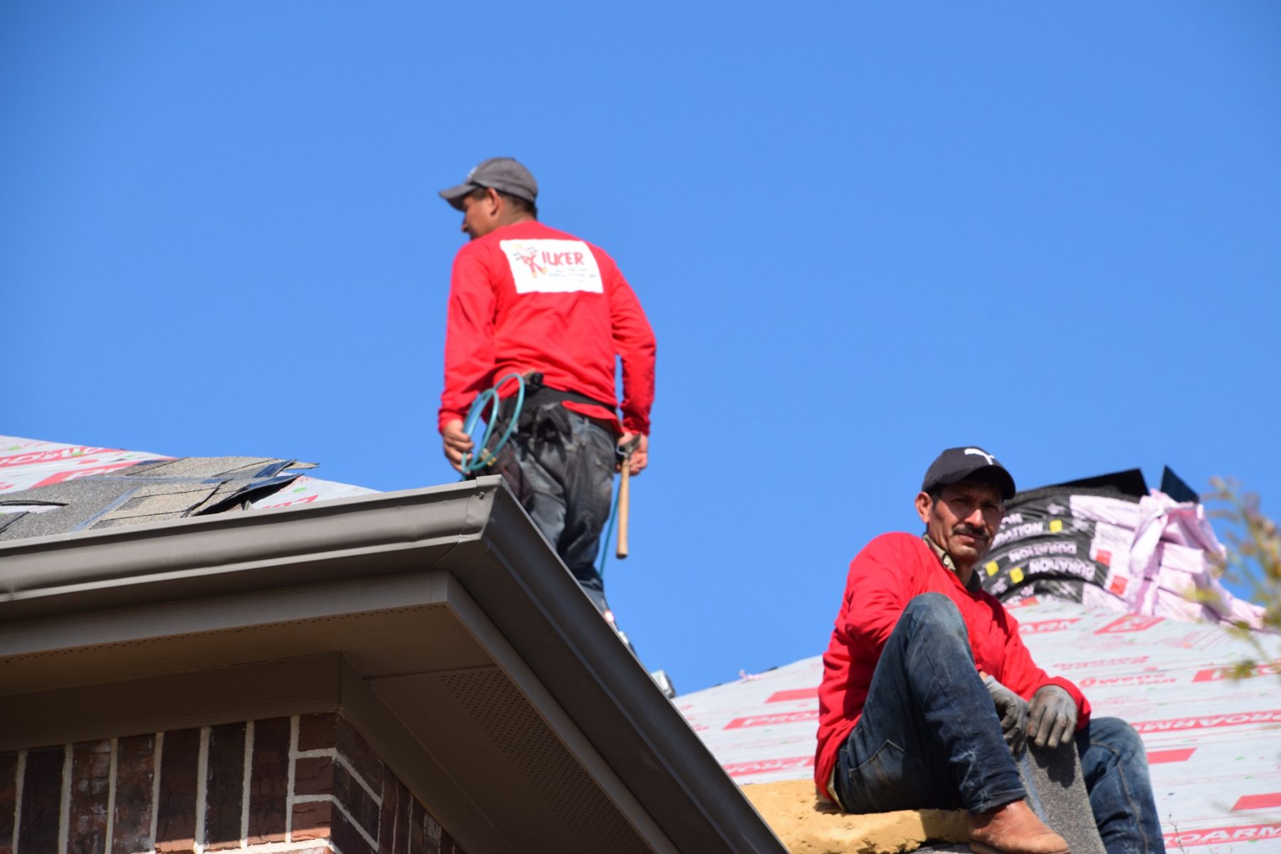 Kilker Roofing crew at work on a residential roof