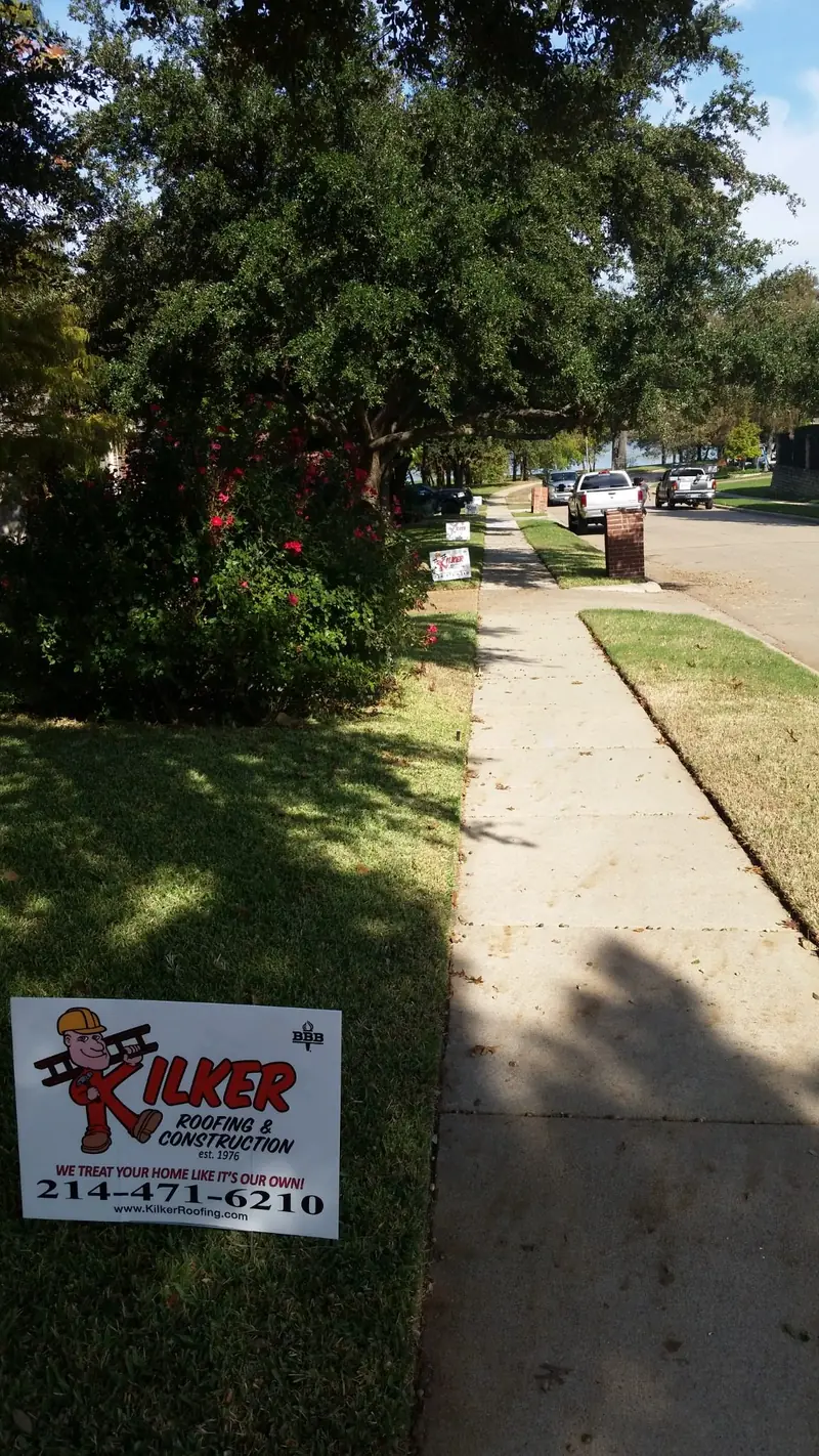 Kilker Roofing yard sign at a finished job